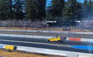 yellow car driving at nhra nationals 2023.