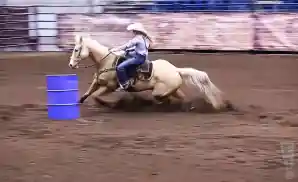 whitly gregory riding a horse at american royal rodeo, may 2023.