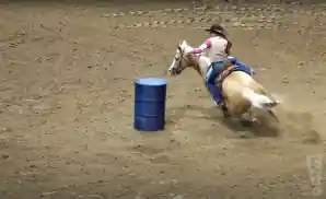 someone riding a horse at college national finals rodeo 2022.