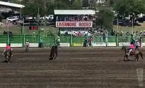 cowboys riding horses at the livermore rodeo 2022.