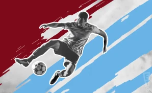 a colorado rapids soccer player kicking the ball down field