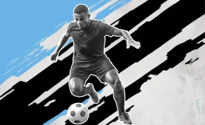 a minnesota united fc soccer player kicking the ball down field 