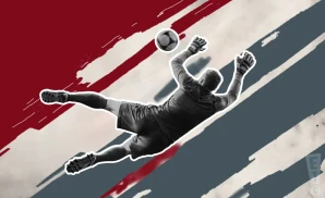 a toronto fc goalkeeper soccer player diving to make a save