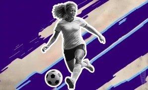 an orlando pride soccer player kicking the ball down field