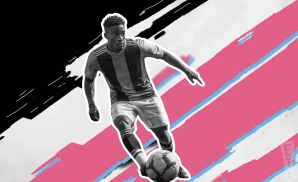 a las vegas lights fc soccer player kicking the ball down field