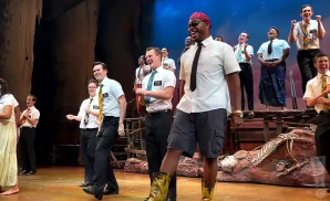 broadway actors performing the play the book of mormon in new york city.