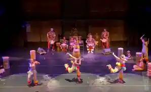 dancers and musicians preforming on stage in danceafrica show.