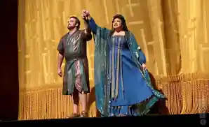 aida cast members posing at the end of the show.