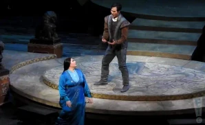 man singing to a lady in the third act of the turandot opera.