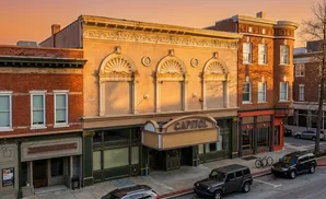 A vintage theater marquee reads 