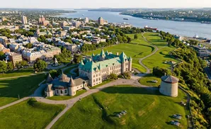 Aerial view of the Plains of Abraham, showing the Château Frontenac and the St. Lawrence River in Quebec City.