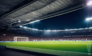 A soccer game at night under stadium lights, with a full stadium of fans.
