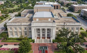 Aerial view of City Hall & Auditorium with grand entrance, columns, and a central fountain.