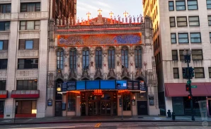 an exterior promotional venue picture of ace hotel los angeles with a sunset sky