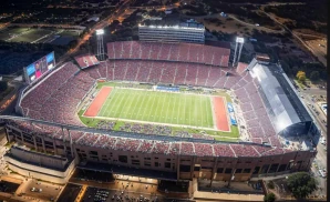 an exterior promotional venue picture of arizona stadium with a night sky