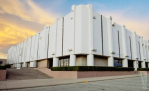 an exterior promotional venue picture of berglund center coliseum with a sunset sky