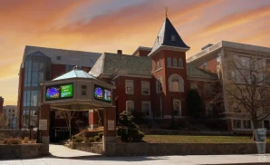 a photograph of mark c. smith concert hall at the von braun center in huntsville, alabama, captured at sunset. 