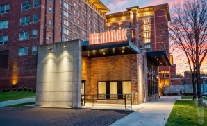 a photograph of delmar hall in st. louis, missouri, captured at sunset. 