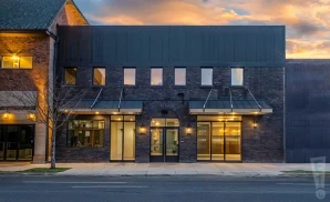 a photograph of district 142 in wyandotte, michigan, captured at sunset. 