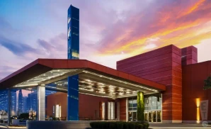 an exterior promotional venue picture of event centre at club regent casino with a sunset sky