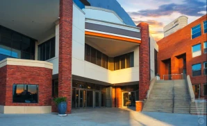 an exterior promotional venue picture of glc live at 20 monroe with a sunset sky