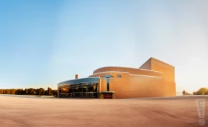 a promotional venue picture of the honeywell center taken from across the street during the sunset