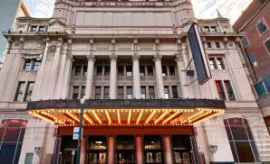 an exterior promotional venue picture of keybank state theatre with a sunset sky