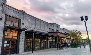 an exterior promotional venue picture of knitting factory concert house boise with a sunset sky
