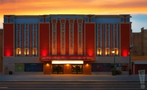 an exterior promotional venue picture of magic stick with a sunset sky