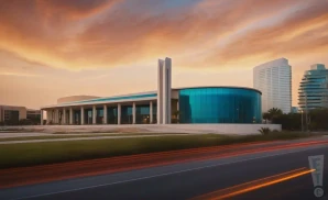 an exterior promotional venue picture of mahaffey theater at the duke energy center for the arts with a cloudy sky