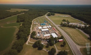 a professional promo picture of the meadow event park empty at sunset with clouds. 