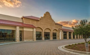 a hyper-realistic wide-angle aerial photograph of mesquite arena in mesquite, texas
