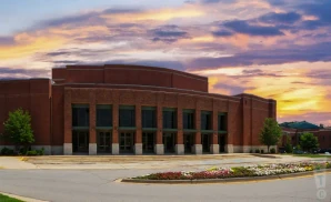 an exterior promotional venue picture of niswonger performing arts center greeneville with a sunset sky