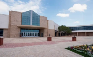 an exterior promotional venue picture of performing arts center at ocean city convention center with a sunny sky