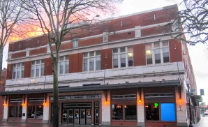 an exterior promotional venue picture of roseland theater with a sunset sky