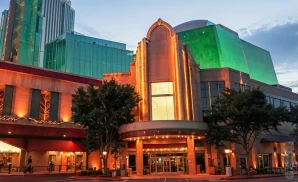an exterior promotional venue picture of silver legacy casino with a cloudy sky