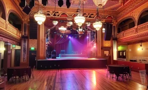 the spanish ballroom at mcmenamins elks temple seen from the interior while empty.