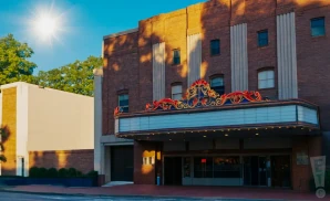 an exterior promotional venue picture of state theatre va with a sunny sky