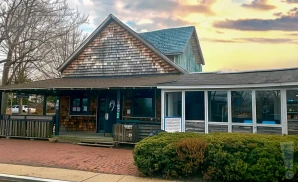 an exterior promotional venue picture of stephen talkhouse with a sunset sky