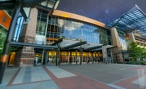 a promotional exterior picture of the buell theatre at night
