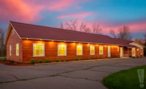 a promotional exterior photograph of the dusty armadillo, a country-themed live music venue located in rootstown, ohio, captured at sunset.
