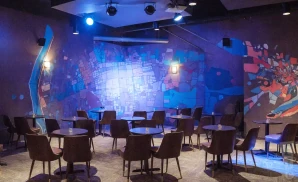 an interior promotional venue picture of the stage of the garage at helium comedy club - st. louis