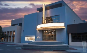 an exterior promotional venue picture of the guild theatre menlo park with a sunset sky