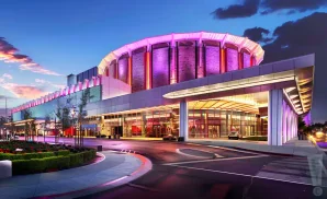 an exterior promotional venue picture of the kia forum from across the street during the night