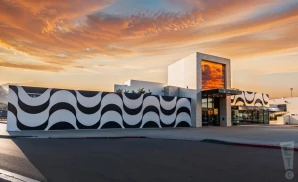 a photograph of the novo in los angeles, california, captured at sunset. 