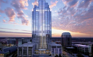 an exterior promotional venue picture of the pinnacle at symphony place with a sunset sky