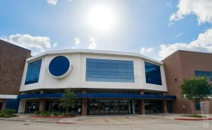exterior promotional venue picture of total mortgage arena with a sunny sky