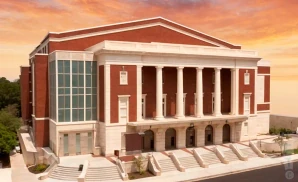 an exterior promotional venue picture of township auditorium in columbia, south carolina, captured at twilight.
