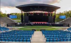 an exterior promotional venue picture of westville music bowl with a sunset sky
