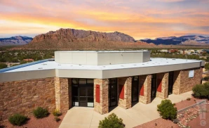 an exterior promotional venue picture of yavapai college performance hall with a sunset sky